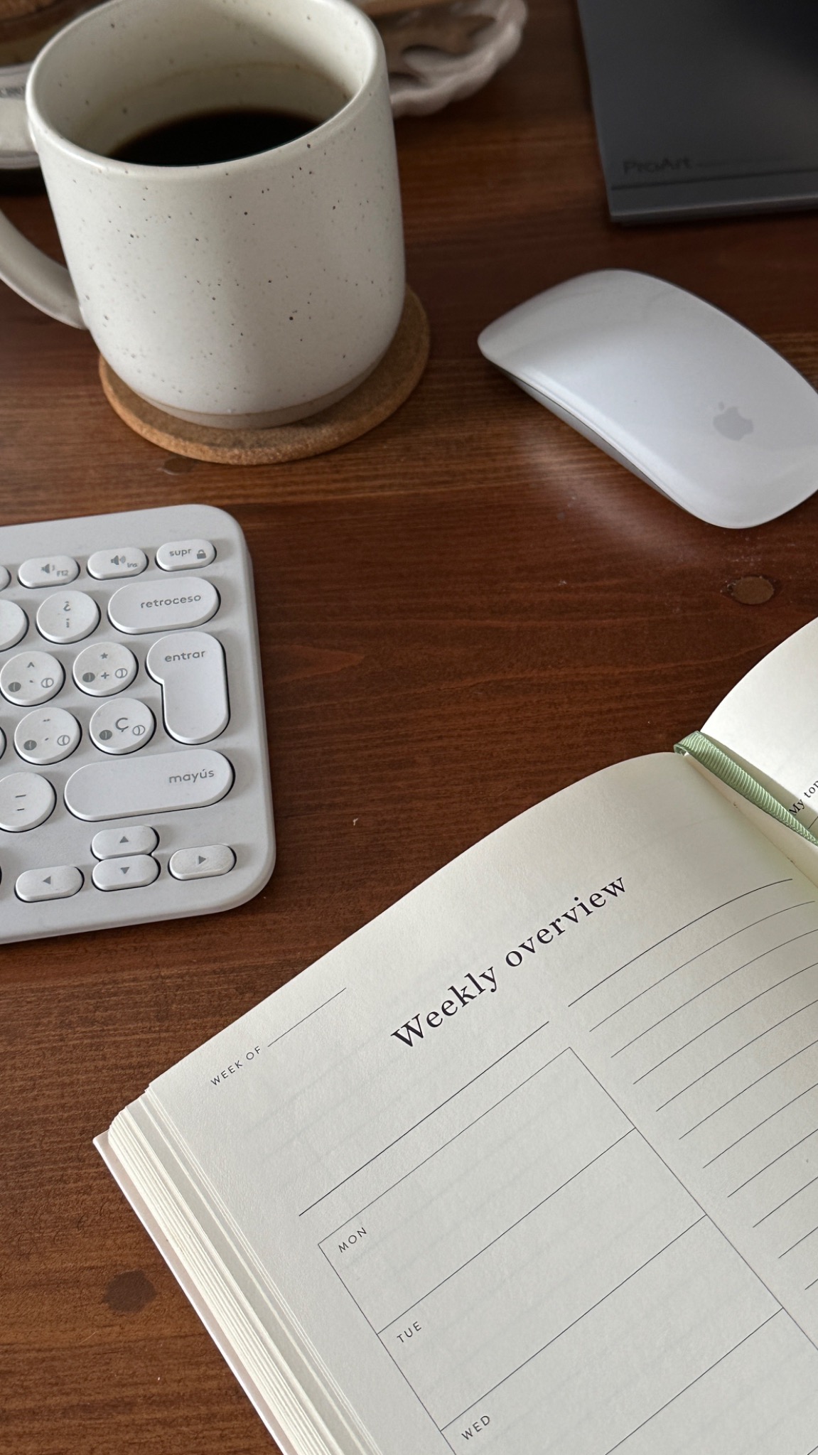 Weekly planner and coffee