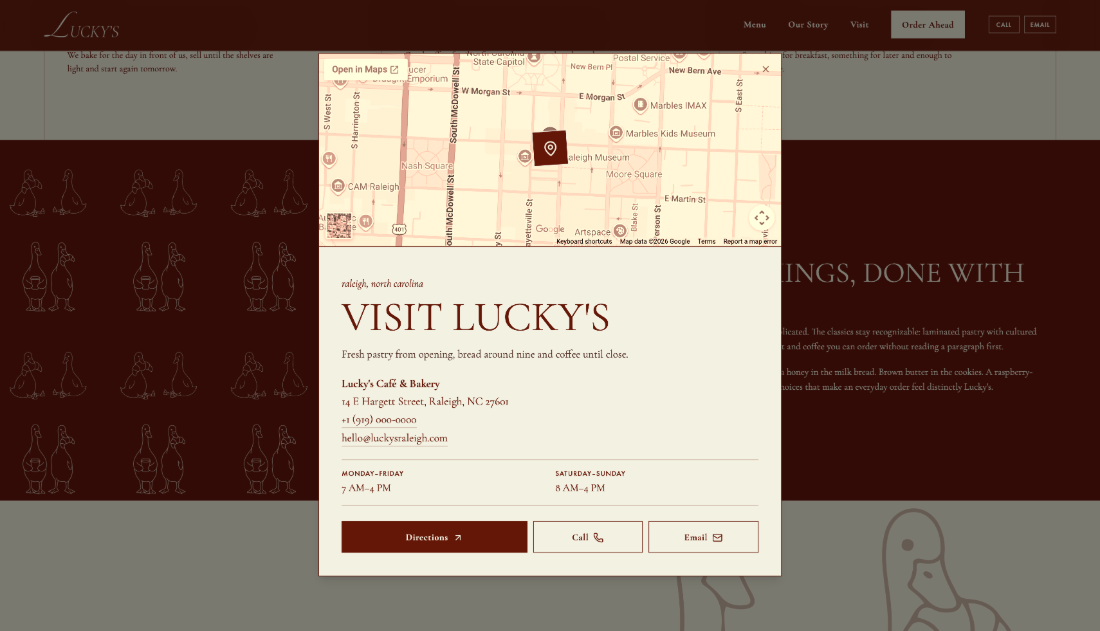 Lucky’s visit and location modal with map, hours and directions